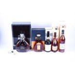 A quantity of boxed armagnac and cognac, comprising: Bas Armagnac Casteréde (ages 20 years, 70cl),