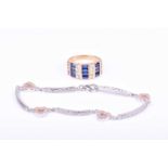 A silver and white sapphire braceletwith bar and heart-shaped links, together with a yellow metal,