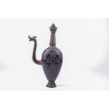 An Indian carved hardstone ewer, with jewelled style decoration, relief carved with stiff leaves and