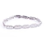 A 14ct white gold and diamond bracelet, the articulated chamfered rectangular segments set with