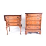 A reproduction walnut veneered bachelors chest , 20th century, with four graduated drawers on