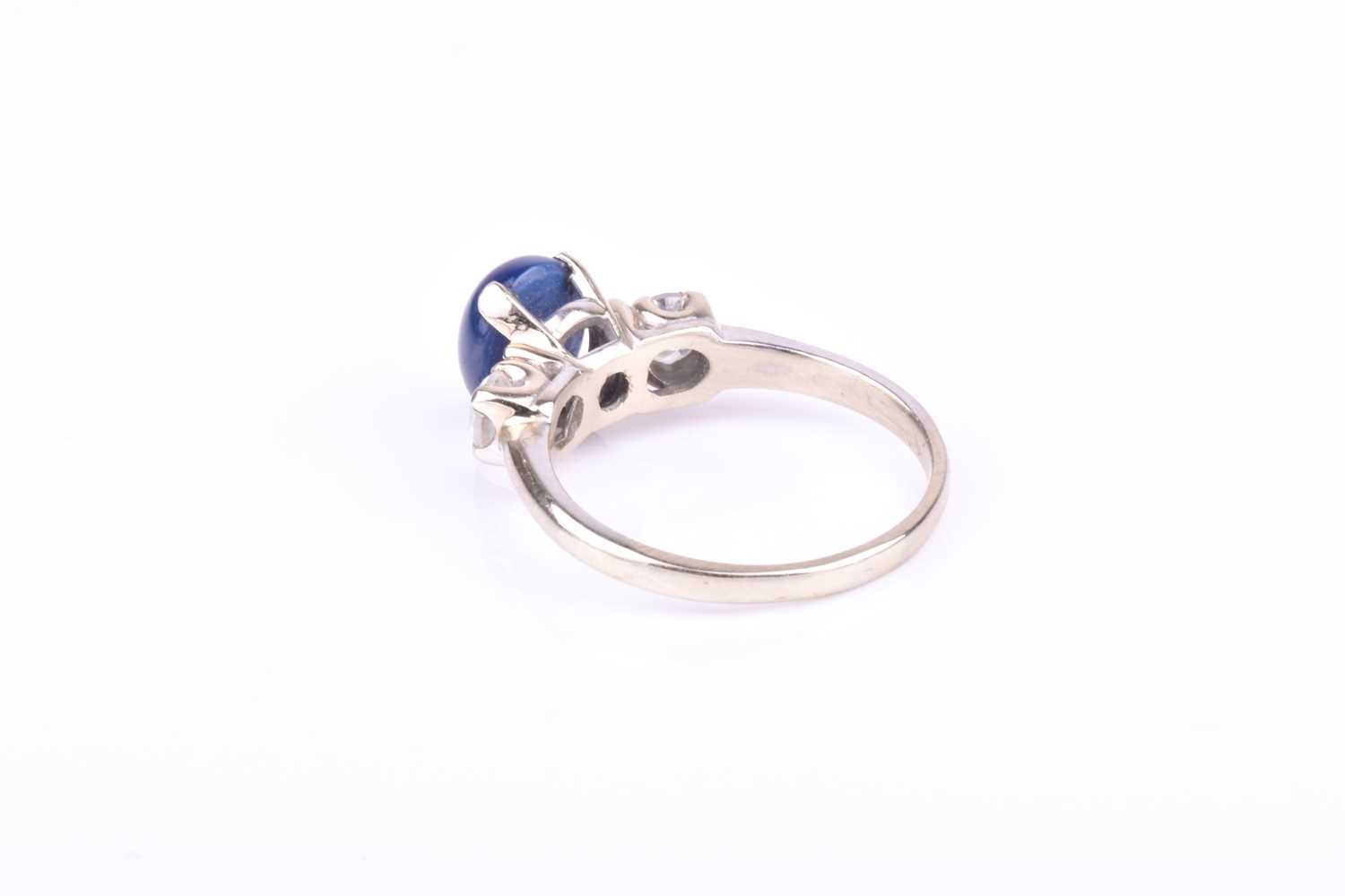 A 14k white gold, star sapphire, and CZ ringset with an oval star sapphire flanked with two round- - Image 2 of 3