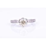 A diamond solitaire ringset with a round brilliant-cut diamond of approximately 1.23 carats,