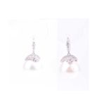A pair of silver and pearl drop earrings, the mounts inset with round-cut CZs, hook fastens,