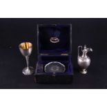 A Victorian silver travelling three-piece communion set, in fitted box, London 1874 by Richards