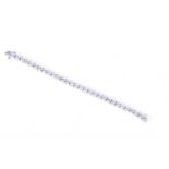 A fine quality 14ct white gold and diamond line bracelet, set with thirty round brilliant-cut