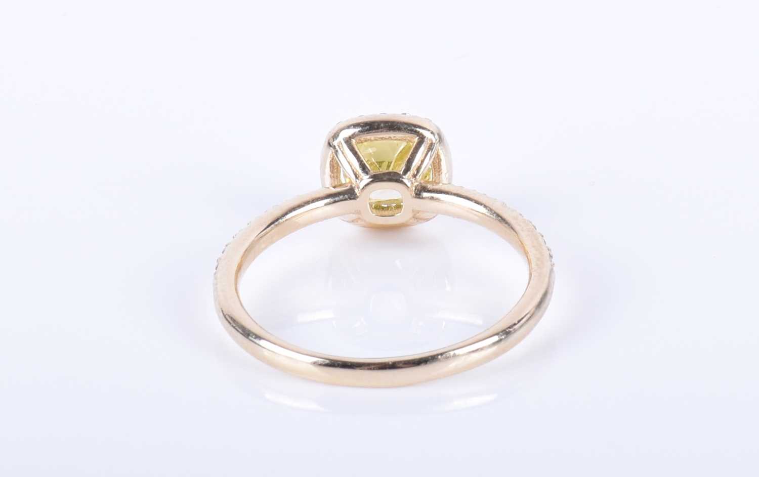 A 14ct yellow gold and yellow diamond halo ringset with a cushion-cut natural fancy intense yellow - Image 5 of 7