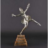 A silvered bronze Art Deco figure of a female dancer, signed 'Jourdain', on a stepped marble base,