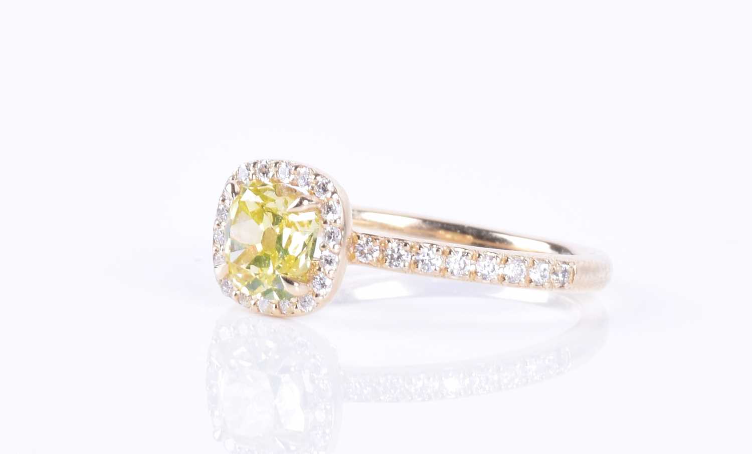 A 14ct yellow gold and yellow diamond halo ringset with a cushion-cut natural fancy intense yellow - Image 3 of 7