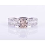 An 18ct white gold and diamond ringset with a round brilliant-cut diamond of approximately 1.20