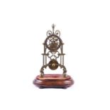 A 19th century brass skeleton clock timepiece, the dial with Roman numerals and with a single