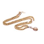 A yellow metal rope-twist link necklace, the chain set with two pearls, unmarked, and susended