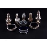 A collection of silver cruets, salts and pepperettes, mixed makers and dates, 416gQty: 9Condition