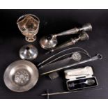 A mixed group of silver items to include a pair of weighted candlesticks (a/f), a small dish, a