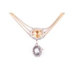 A 19th century citrine and diamond drop pendant necklaceset with a mixed-cut citrine within a border