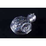 A late Victiorian silver scent bottle case, William Comyns & Sons, London 1899, the hinged lid and