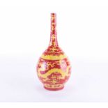 A Chinese onion shape vase, 20th century, the neck incised with yellow clouds above a band of waves,