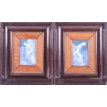 A pair of Continental 19th century Pate Sur Pate plaques, both depicting nude maidens and