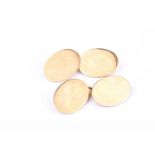 A pair of 18ct yellow gold gentleman's cufflinkswith plain oval plaques, in an antique box.Condition