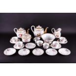 A 19th French, possibly Paris porcelain tea set with painted floral decoration and gilt heightening.