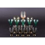 A collection of coloured glass drinking vessels, to include five green 'Bristol' style wine glasses,