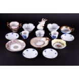 A mixed group of 18th century and later porcelain to include a twin-handled cabinet cup, with hand-