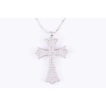 A diamond-set cross-shaped pendantpave-set with round brilliant-cut diamonds of approximately 1.50