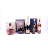 Four boxed spirits comprising: Menuet XO Extra Old Cognac (1L), Jean Cavé Vieil Armagnac (70cl),