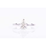 An 18ct white gold and diamond ringset with a mixed pear-cut diamond of approximately 1.08 carats,