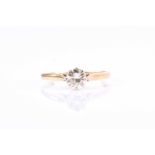 An 18ct yellow gold and solitaire diamond ringset with a round brilliant-cut diamond of