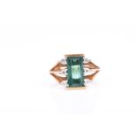 An 18ct yellow gold, diamond, and green tourmaline ringset with a rectangular-cut tourmaline, the