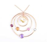 Marco Bicego. An 18ct yellow gold and multi-gemstone pendant, from the 'Jaipur' collection, the