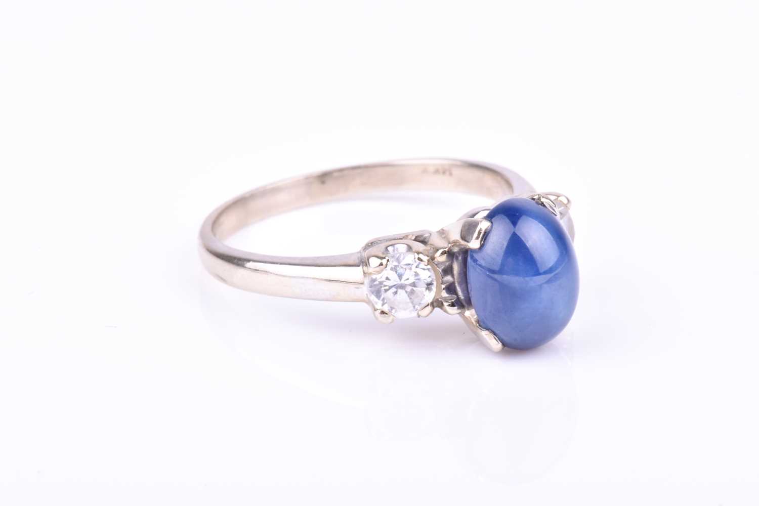 A 14k white gold, star sapphire, and CZ ringset with an oval star sapphire flanked with two round- - Image 3 of 3