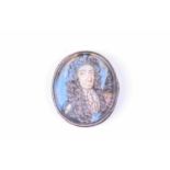 A small portrait miniature of King William III, possibly formerly from a ring, 18mm x 16mm