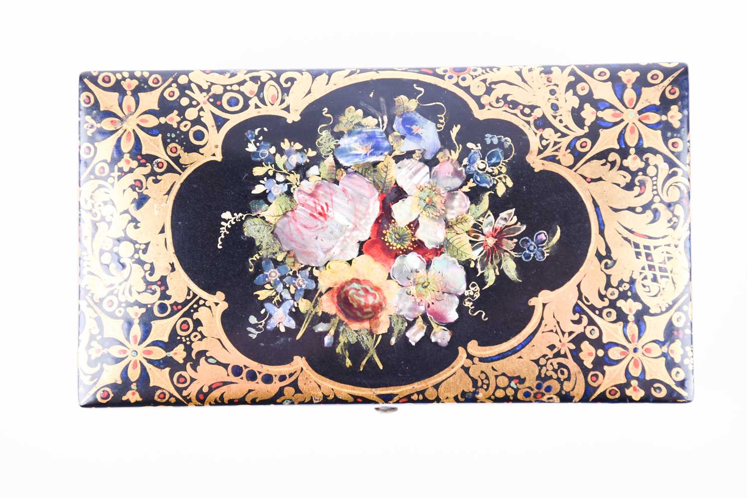 A Victorian lacquered necessaire box, of rectangular form, the lid inlaid with mother of pearl,
