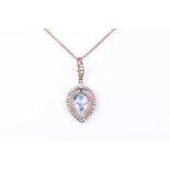 A late 19th / early 20th century diamond and aquamarine pendant, the tapered frame mount inset