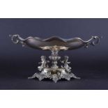 A Continental silver table centrepiece, the twin-handled oval bowl supported on a knopped column,