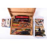 A quantity of artists brushes, pastels, pencils, and inks contained in a wooden traveling box,