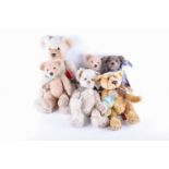 Six collectable teddy bears comprising, a large Stonegate Teddy Bears 'Big Softie' growling bear,