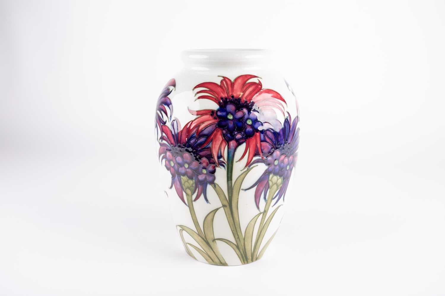 A William Moorcroft 'Cornflower' pattern vase, circa 1930, decorated on a white ground, inscribed - Image 6 of 6