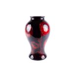 A William Moorcroft flambé 'Big Poppy' pattern vase, circa 1930, of baluster form, the poppies