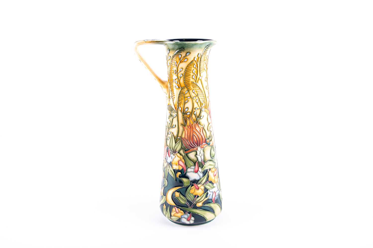 A Moorcroft 'Prairie' pattern ewer, designed by Rachel Bishop, date cypher 2005, with a shaded green