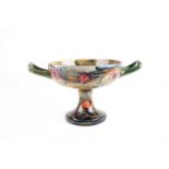 A William Moorcroft 'Spanish' pattern pedestal bowl, circa 1910/15, the circular bowl with two
