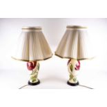 A large pair of Moorcroft 'Poppy' pattern table lamps, the red flowers against a cream ground,