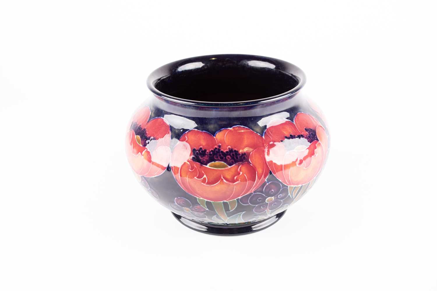 A William Moorcroft Big Poppy pattern vase, early 20th century, of cylindrical form, with a shaded