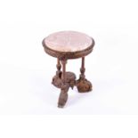 A gilt gesso marble topped occasional table, the inset pink veined marble top with a moulded ovolo