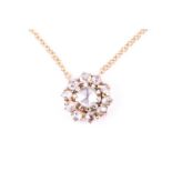 A yellow gold and rose-cut diamond cluster pendant, the circular cluster set with eleven rose-cut