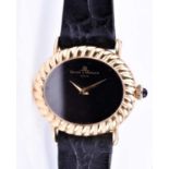 A Baume and Mercier ladies wristwatch, the oval black dial with yellow metal ribbed bezel,