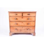 A Victorian mahogany chest of drawers, with two short and three long graduated drawers, with