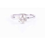 An 18ct white gold and solitaire diamond ring, the round brilliant-cut diamond of approximately 1.08